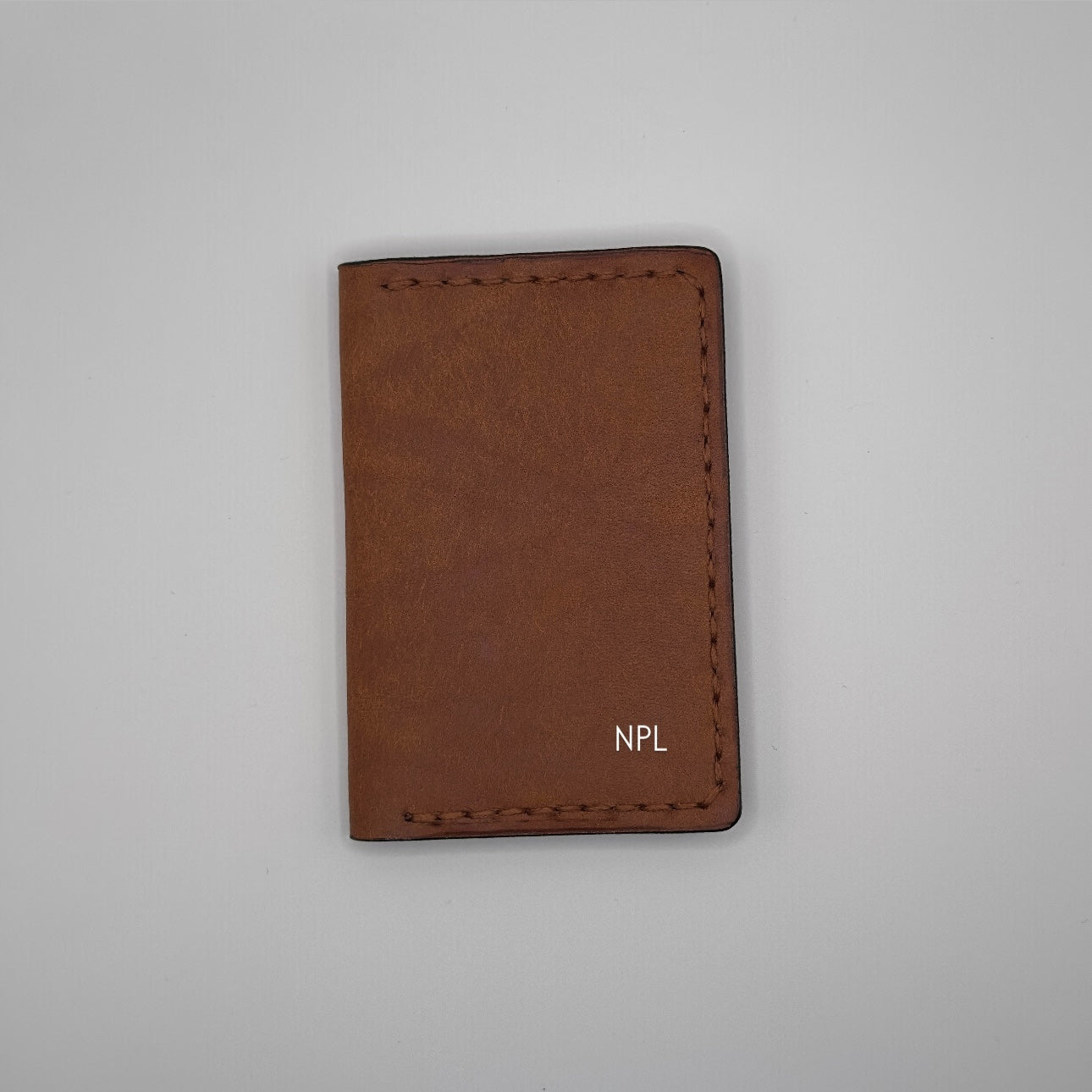 an example of the initial letters on the luxury leather bifold wallet