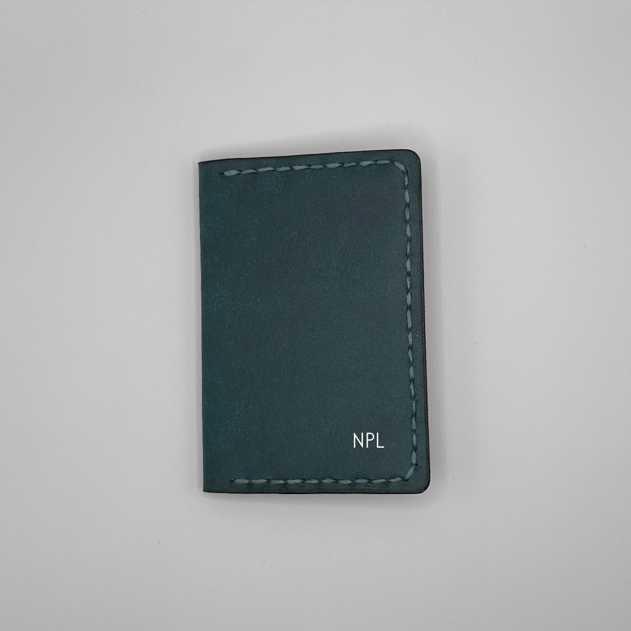 an example of the initial letters on the luxury leather bifold wallet