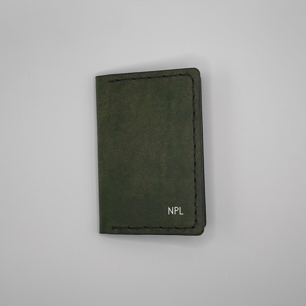 an example of the initial letters on the luxury leather bifold wallet